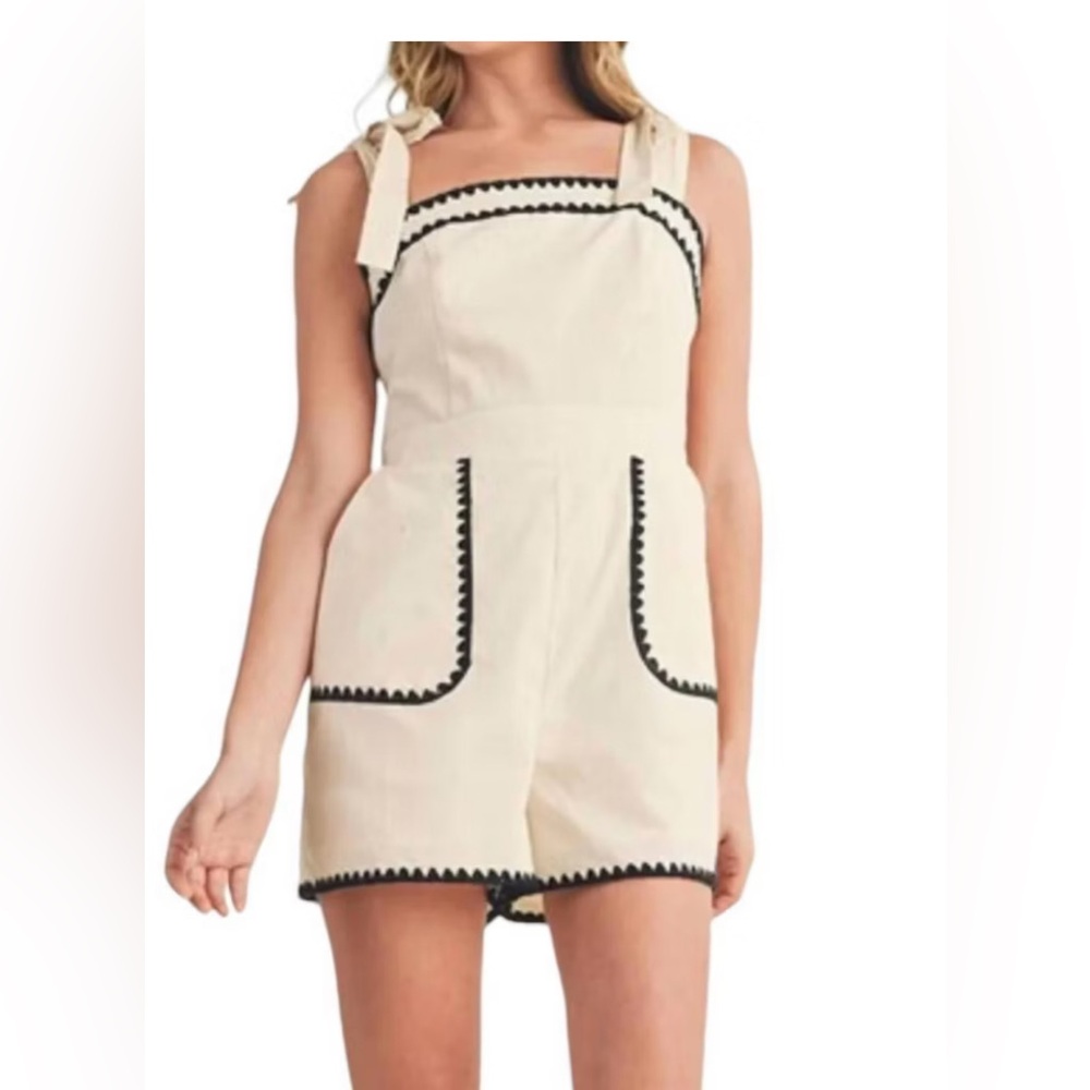 &Merci Chic Cream Romper with Black Trim